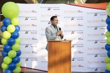 Speaker at the podium of the donate life event