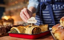 A food server preparing food